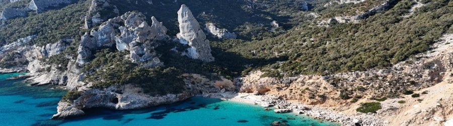 Entalula Beach Palawan with turquoise water, limestone cliffs, and soft white sand