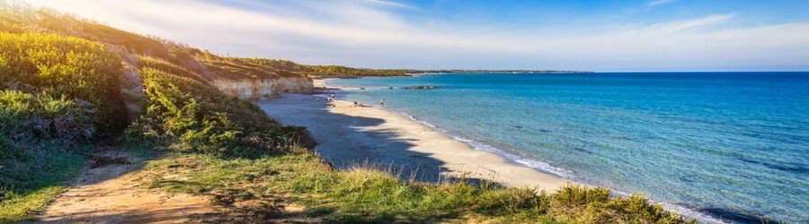 Baia dei Turchi beach near Otranto with clear water and sandy shoreline