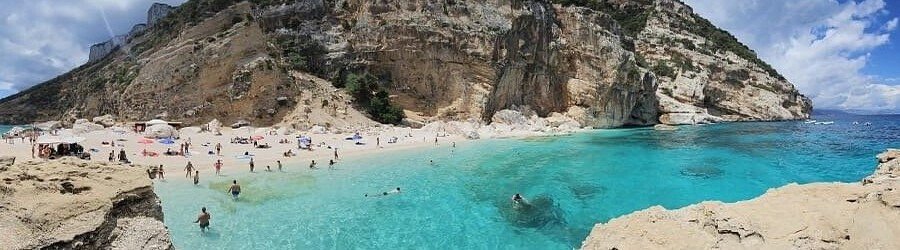 Cala Mariolu beach in Sardinia with turquoise water and rocky cliffs