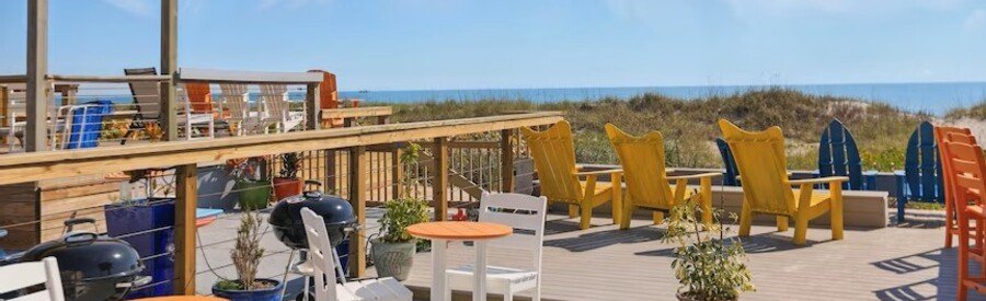 Outdoor seating area at Cocoa Sands Beach Cottages near the beach in Cocoa Beach, Florida.