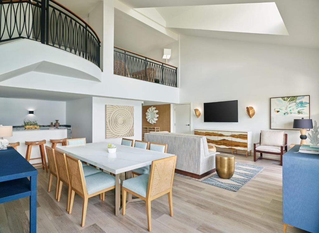 Large suite living area at The Westin St thomas with dining table, seating area, and open loft-style layout
