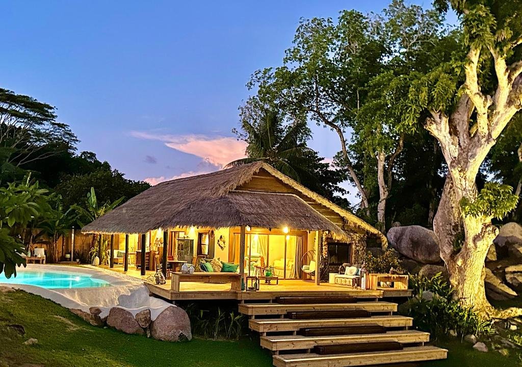 Private bungalow with pool at Chateau de Feuilles Praslin Island