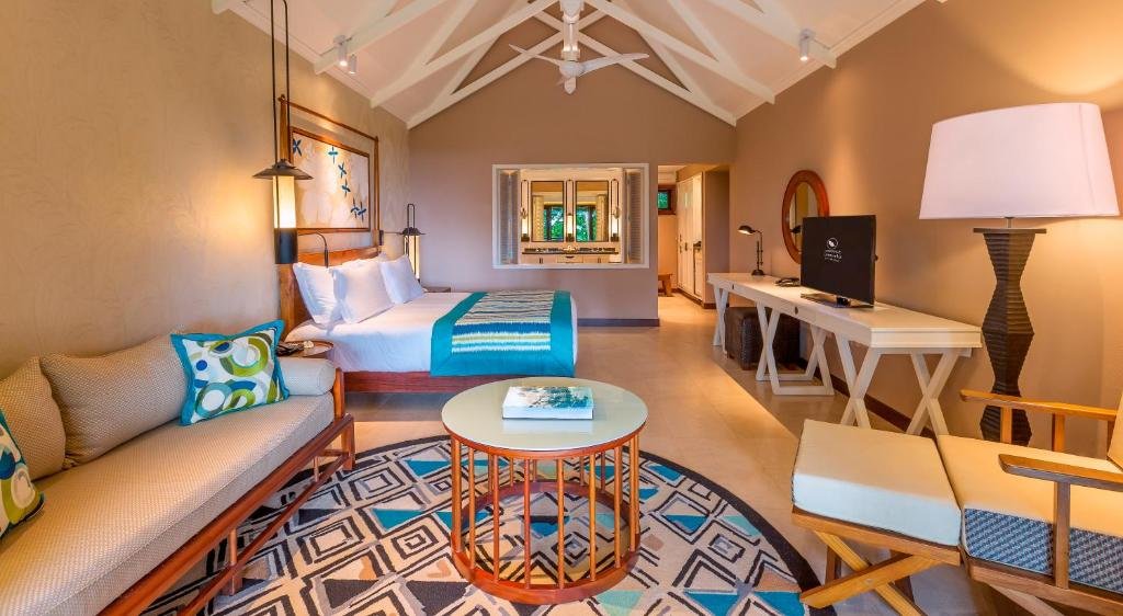 Spacious guest suite interior at Constance Lemuria resort Praslin Island