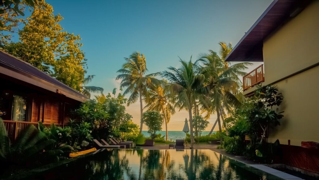 Tropical pool and garden view at Dhevatara Beach Hotel Praslin Island