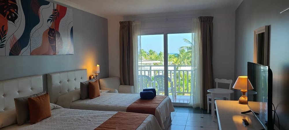 Grand Memories Cayo Largo resort pool villas and guest room on Cayo Largo island Cuba