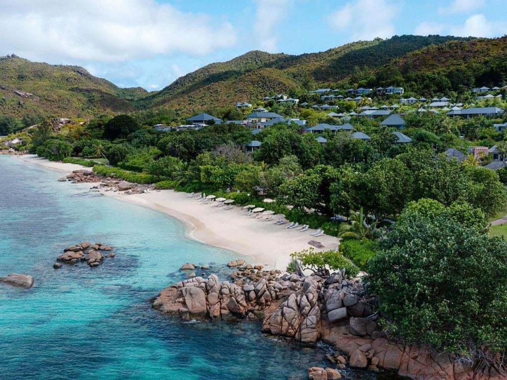 Raffles Seychelles resort overlooking beach and coastline on Praslin Island