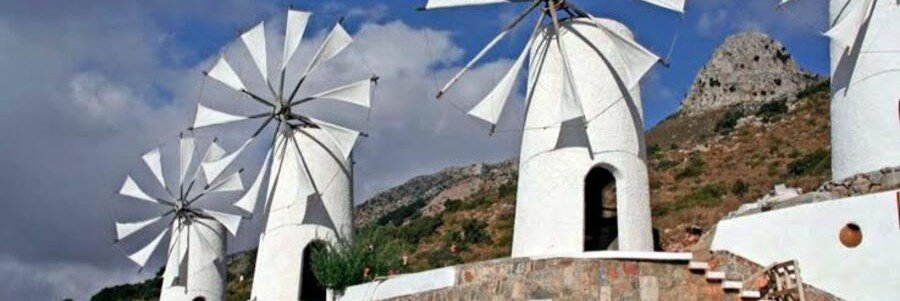 Traditional windmills on the Lassithi Plateau near Crete Beaches