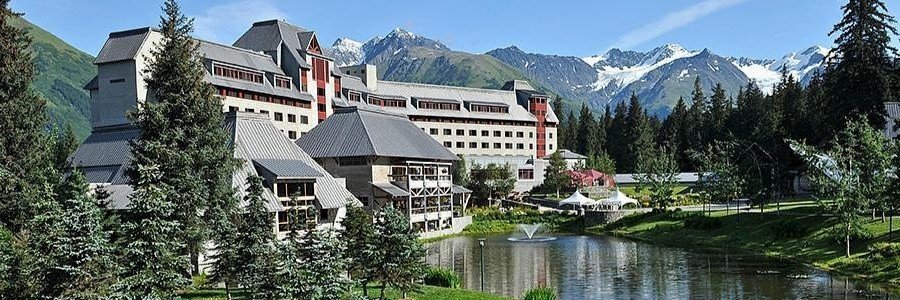 Alyeska Resort in Girdwood | Beach Travel Destinations Alyeska Resort surrounded by mountains in Girdwood near Anchorage