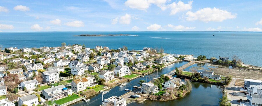 Canal Beach Westport Connecticut coastal aerial view with homes waterways and Long Island Sound