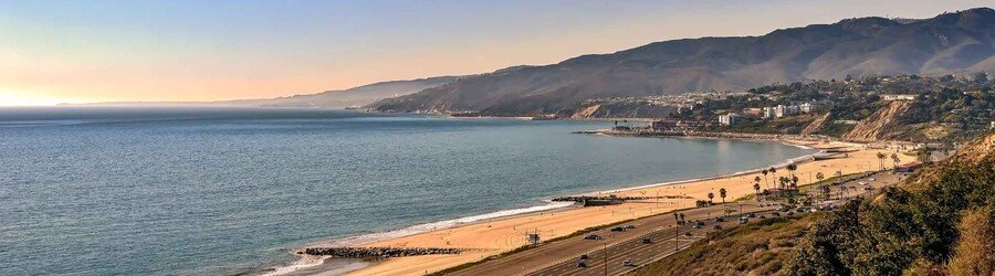 Scenic view of Santa Monica’s coastline with mountains, beaches, and the Pacific Coast Highway.