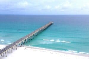 This image has an empty alt attribute; its file name is Navarre-Beach-Pier-300x200.jpg