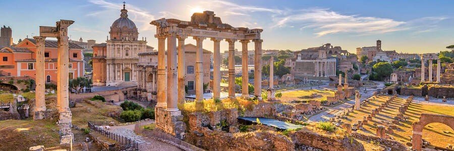 Roman Forum ruins in Rome with historic columns and sunset light near Colosseum