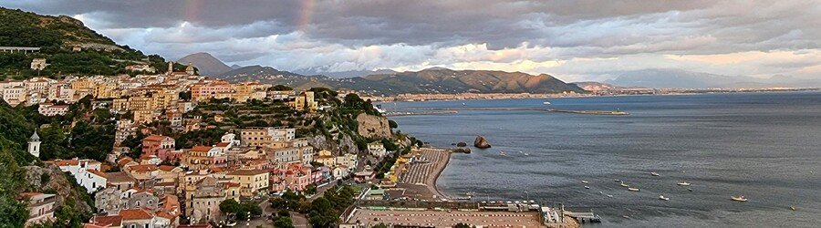 Beaches along the Salerno coastline with blue sea and town views