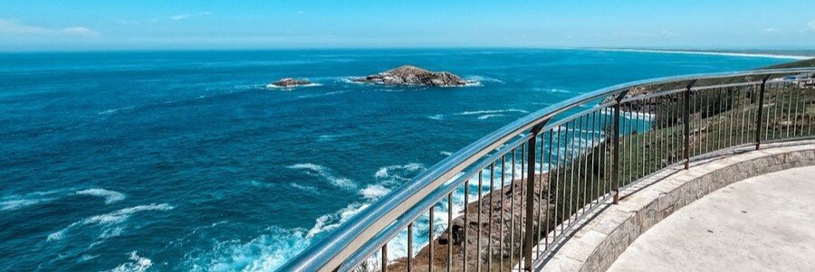 Ocean view from Mirante da Cabocla in Arraial do Cabo with blue water and rocky coastline.