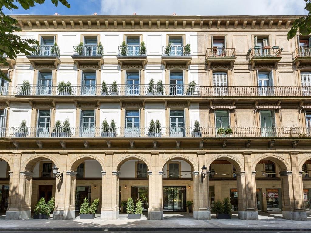 Exterior of Room Mate Collection Gorka hotel with classic architecture and balconies