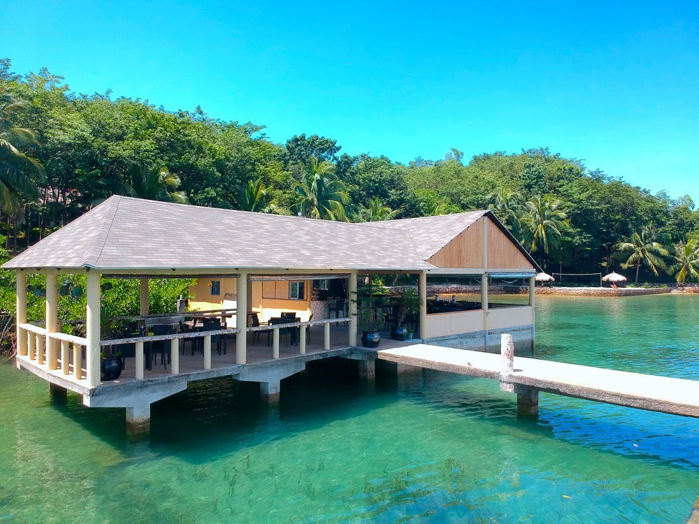 Chindonan Dive Resort waterfront dining pavilion over clear turquoise water