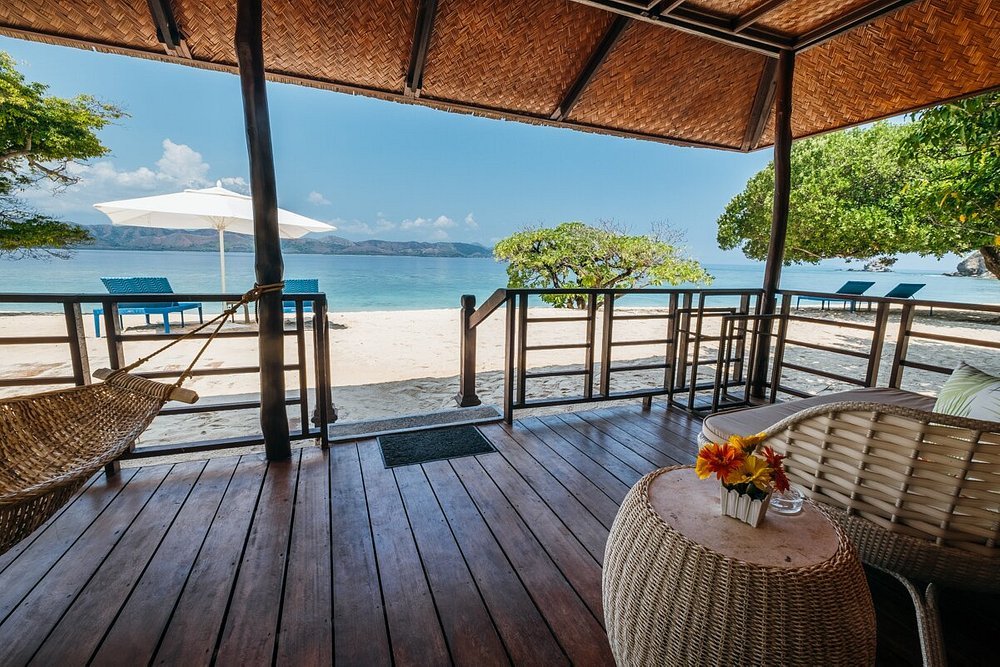 Beachfront terrace at Discovery Coron overlooking calm turquoise sea