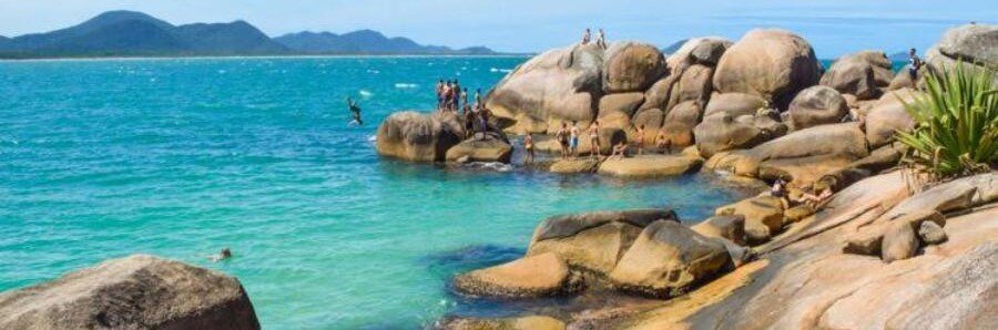 Barra da Lagoa Natural Pools Florianopolis | Beach Travel Destinations Natural rock pools at Barra da Lagoa in Florianópolis with turquoise water and granite boulders.