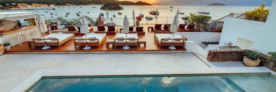 Casas Brancas Hotel & Spa Overlooking Búzios Bay | Beach Travel Destinations Luxury pool terrace overlooking Búzios Bay at Casas Brancas Hotel & Spa in Brazil.
