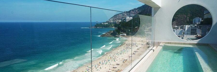 The luxury rooftop pool at Janeiro Hotel overlooking Leblon Beach in Rio de Janeiro