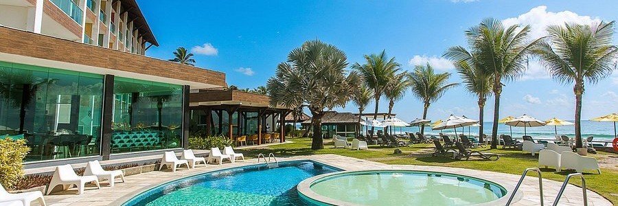 Beachfront pool and lounge area at Kembali Hotel Porto de Galinhas Adults Only overlooking the Atlantic Ocean.