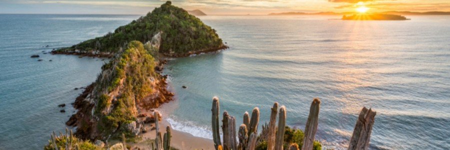 Mirante do Pai Vitório View in Búzios | Beach Travel Destinations View from Mirante do Pai Vitório overlooking a rocky peninsula and the Atlantic Ocean in Búzios, Brazil.