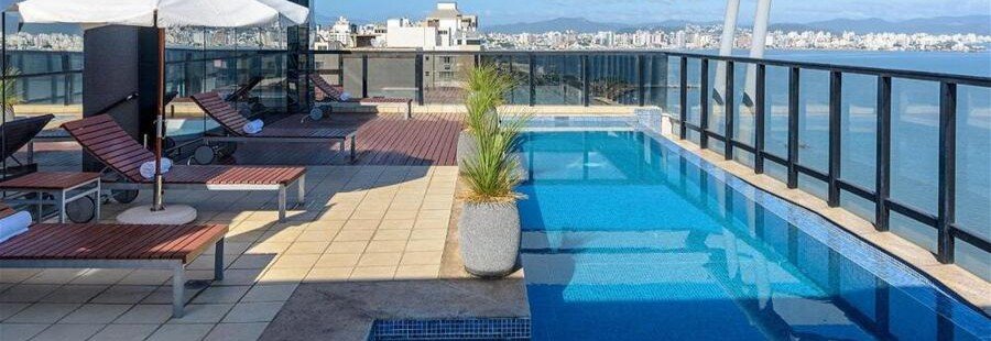 Novotel Florianópolis Rooftop Pool | Beach Travel Destinations Rooftop swimming pool overlooking Florianópolis Bay at Novotel Florianópolis.