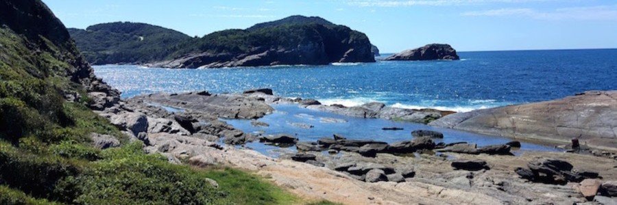 Ponta da Lagoinha Rock Formations in Búzios Ancient rock formations, natural pools, and Atlantic Ocean views at Ponta da Lagoinha in Búzios, Brazil.