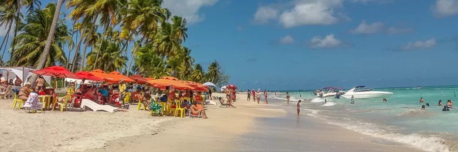 Praia de Antunes in Maragogi | Beach Travel Destinations Beach umbrellas and turquoise water at Praia de Antunes in Maragogi, Brazil