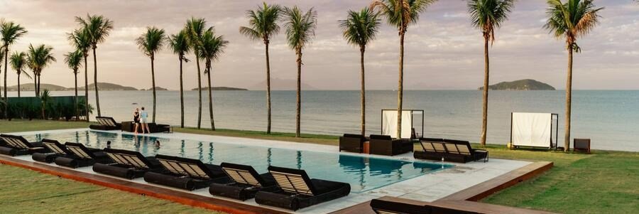 Oceanfront Pool at Zendaya Resort Búzios | Beach Travel Destinations Infinity pool overlooking the ocean at Zendaya Resort Beach Sport & Spa in Búzios, Brazil.