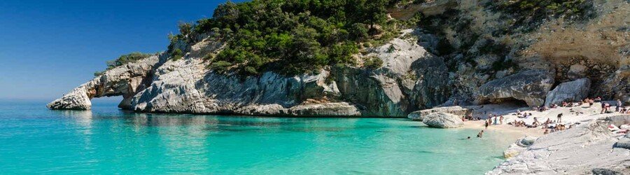 Cala Goloritzé with limestone cliffs and clear water