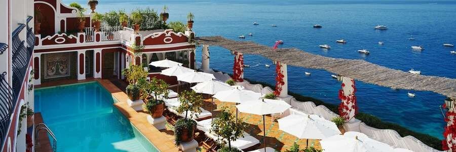 Pool terrace overlooking the Mediterranean Sea at Le Sirenuse in Positano