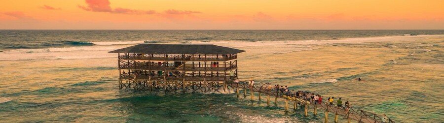 Cloud 9 boardwalk at sunset in Siargao