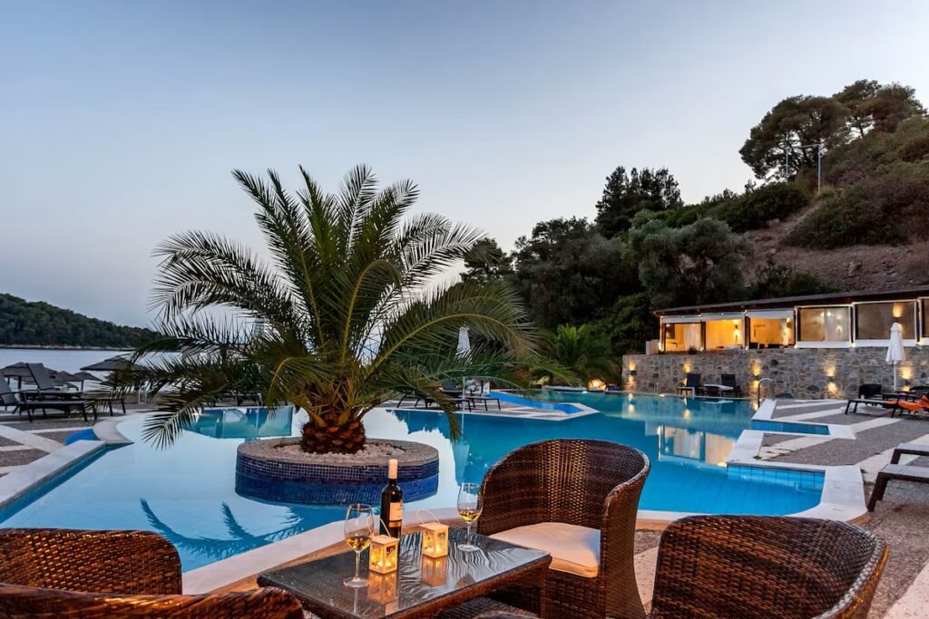 Blue Green Bay hotel in Skopelos with cozy rooms, seaside dining, and pool overlooking the beach