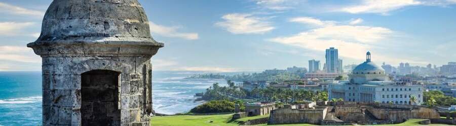 Old San Juan coastal view with historic fort tower overlooking the ocean in Puerto Rico