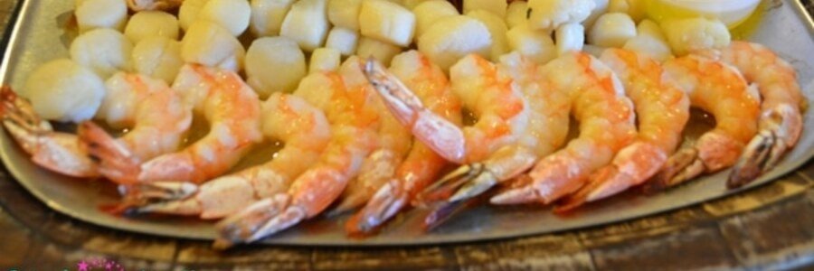 Fresh Florida rock shrimp served with potatoes on a platter at a Jacksonville seafood restaurant.