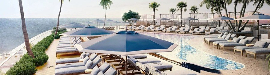 Oceanfront infinity pool with lounge chairs at Four Seasons Resort Fort Lauderdale overlooking the Atlantic Ocean.