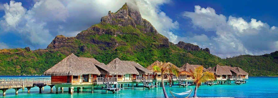french-polynesia-lagoon-mountain-cruise-ship-palm-trees