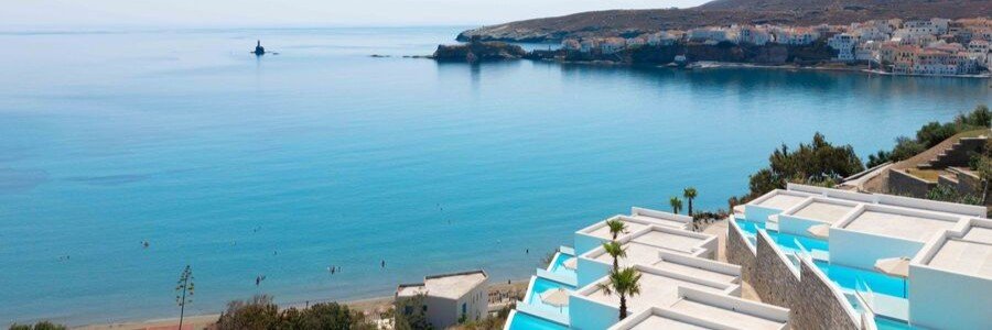Golden Vista Beachfront Suites overlooking the sea and coastline on Andros Island, Greece.
