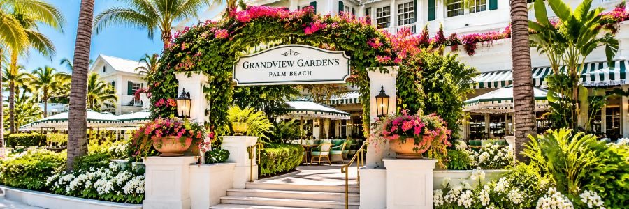 Grandview Gardens in West Palm Beach surrounded by tropical palms, flowering bougainvillea, and lush gardens