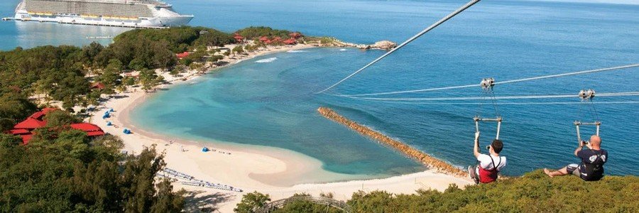 Cruise ship, sandy beach, and zipline over the water at Labadee, Haiti