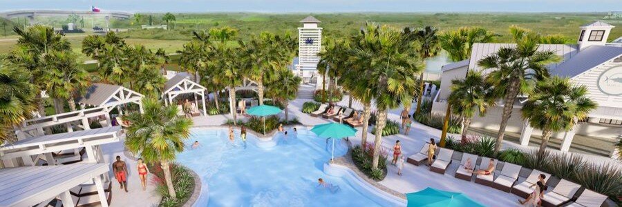 Tropical lagoon-style pool surrounded by palm trees and luxury accommodations at Palmilla Beach Resort in Port Aransas.
