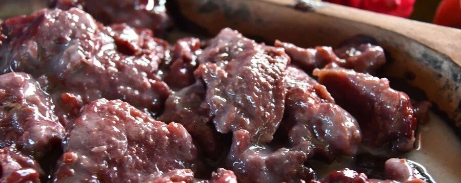 A scuba diver explores the vibrant lagoon of the Gambier Islands in French Polynesia, where clear water, coral reefs, and tropical fish create excellent conditions for snorkeling and diving adventures.
