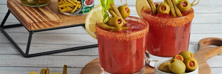 Datil pepper Bloody Mary garnished with olives, pickled vegetables, and lemon slices in St Augustine.