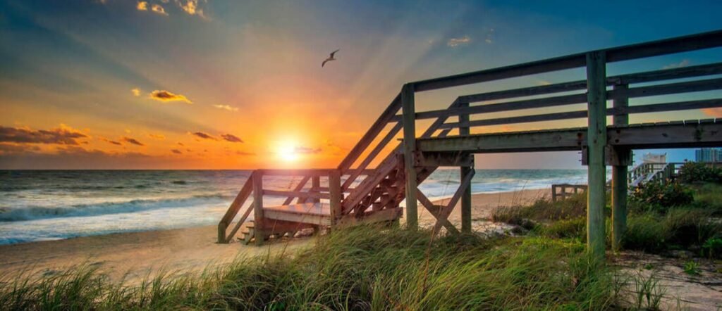 Sunrise at Vero Beach Florida | Beach Travel Destinations Beach access boardwalk at sunrise along Vero Beach, Florida