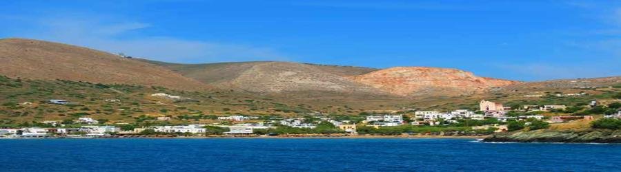 Kini Bay is lively and scenic, offering tavernas, calm swimming, and stunning sunsets.