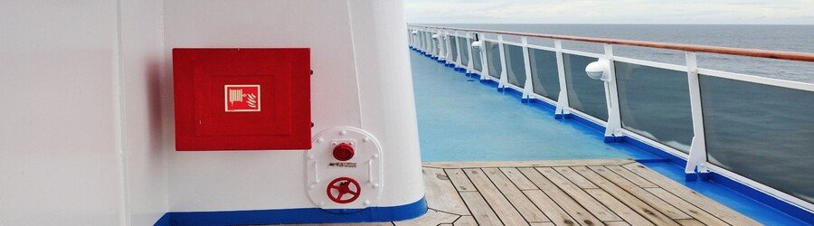 Cruise ship safety equipment and open deck area overlooking the ocean