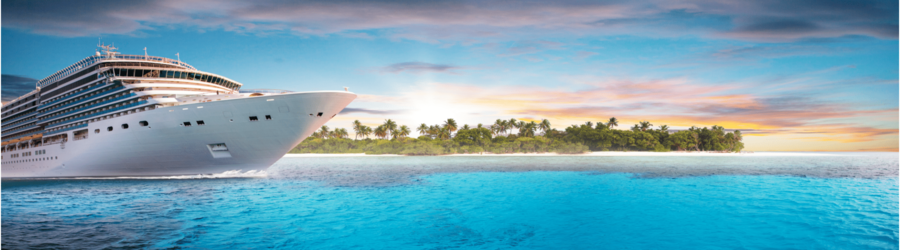 Large cruise ship sailing toward a tropical island with palm trees and turquoise waters at sunrise.