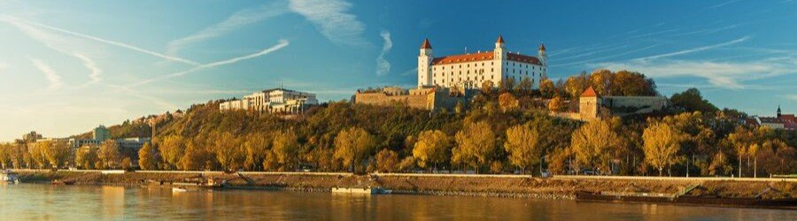 Bratislava Castle overlooking the Danube River and the city skyline in Bratislava, Slovakia.