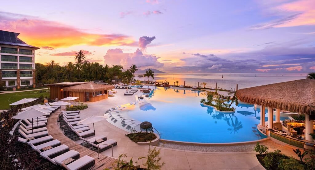 Modern oceanview rooms and pool area at Hilton Tahiti resort with tropical coastal views